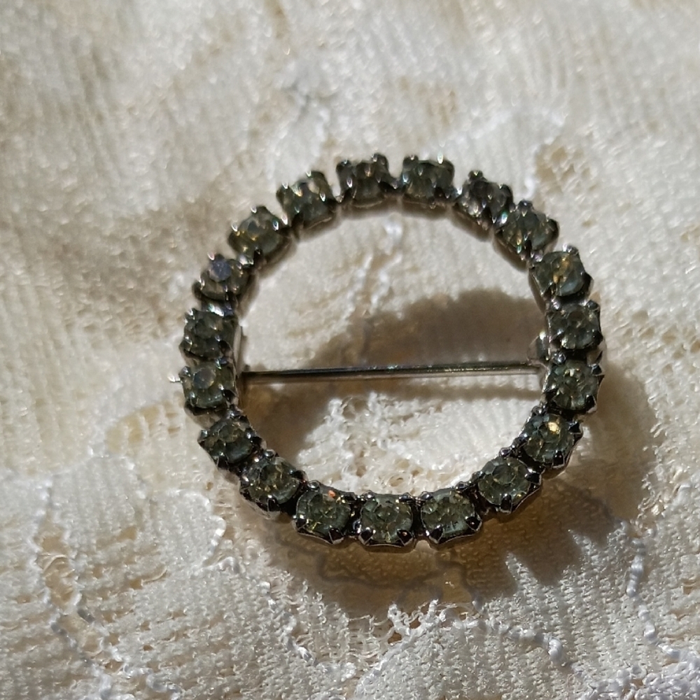 Elegant Silver-Toned Crystal Brooch